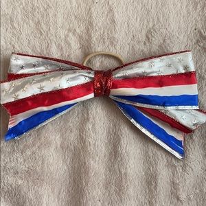 A cheerleading bow🎀